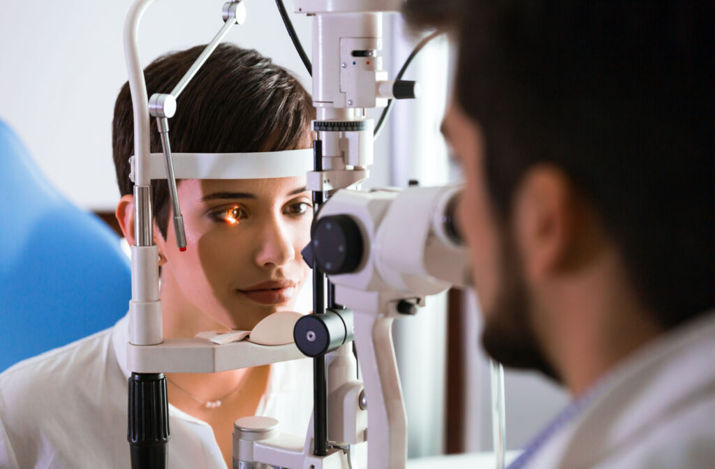 Close-up of a woman undergoing a slit-lamp exam