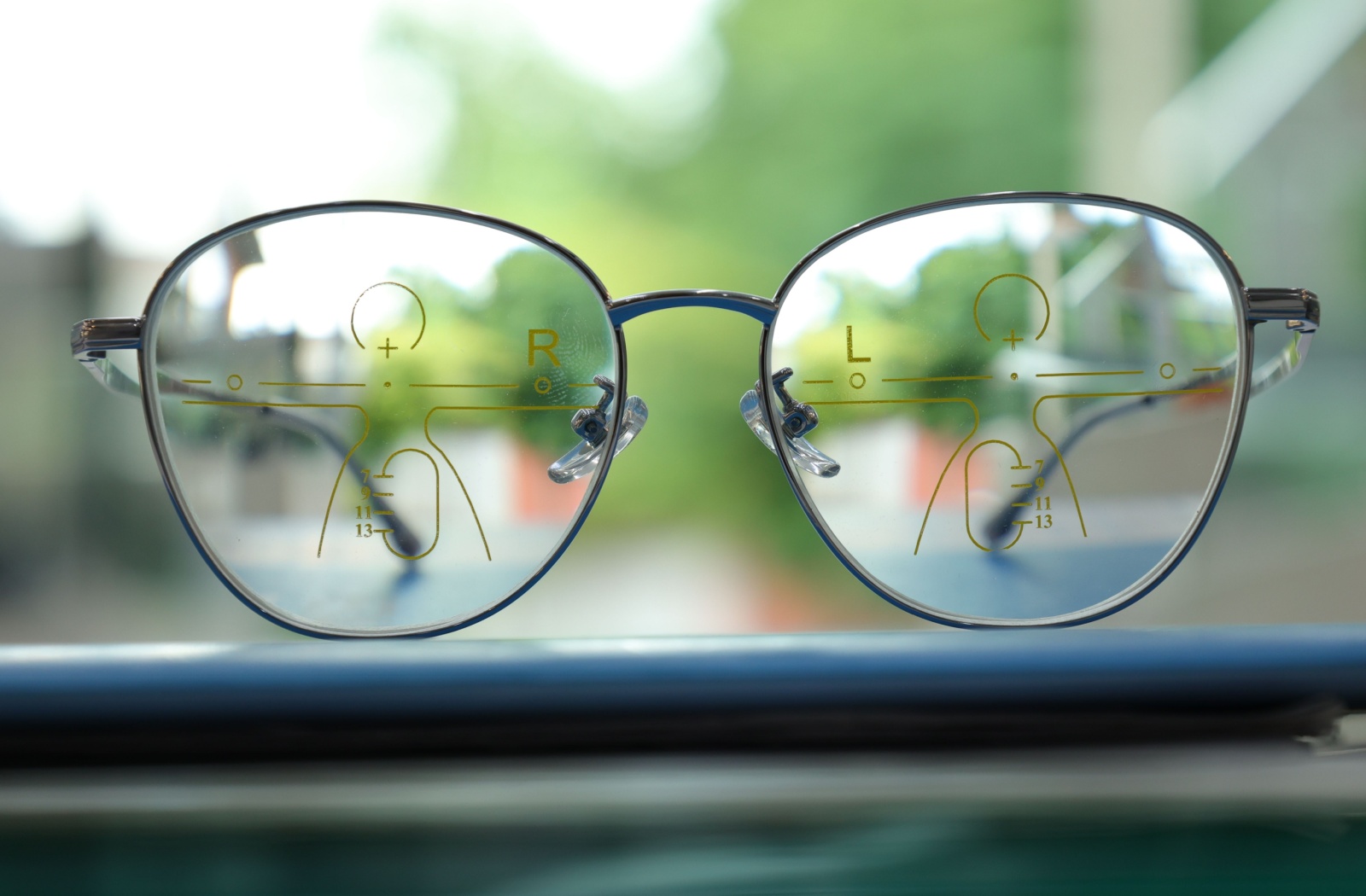 The visual markings on progressive glasses outline its three optical zones: near, intermediate, and far.